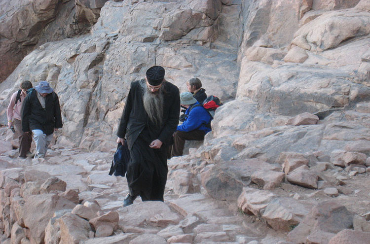 Egypt, Mount Sinai, A priest walking up Mount Sinai - © From Flickr user Gloria-Euyoque, Walkopedia